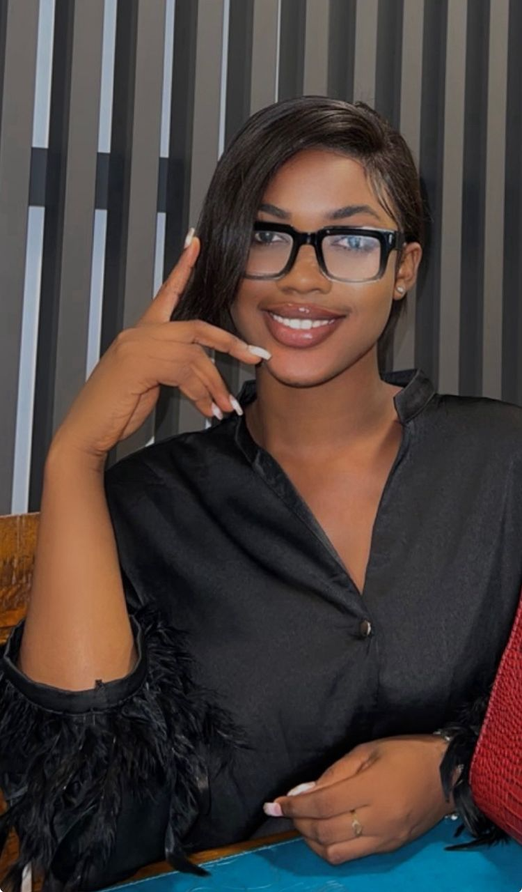 Sandra Allotey Working at Desk